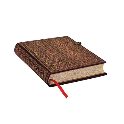 Red Journal with golden embellishment on its back. There is a bright red bookmark. A paisley pattern is visible on the edge of the pages of this journal.